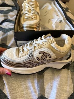 CHANEL White and Gold Low-Top Sneakers